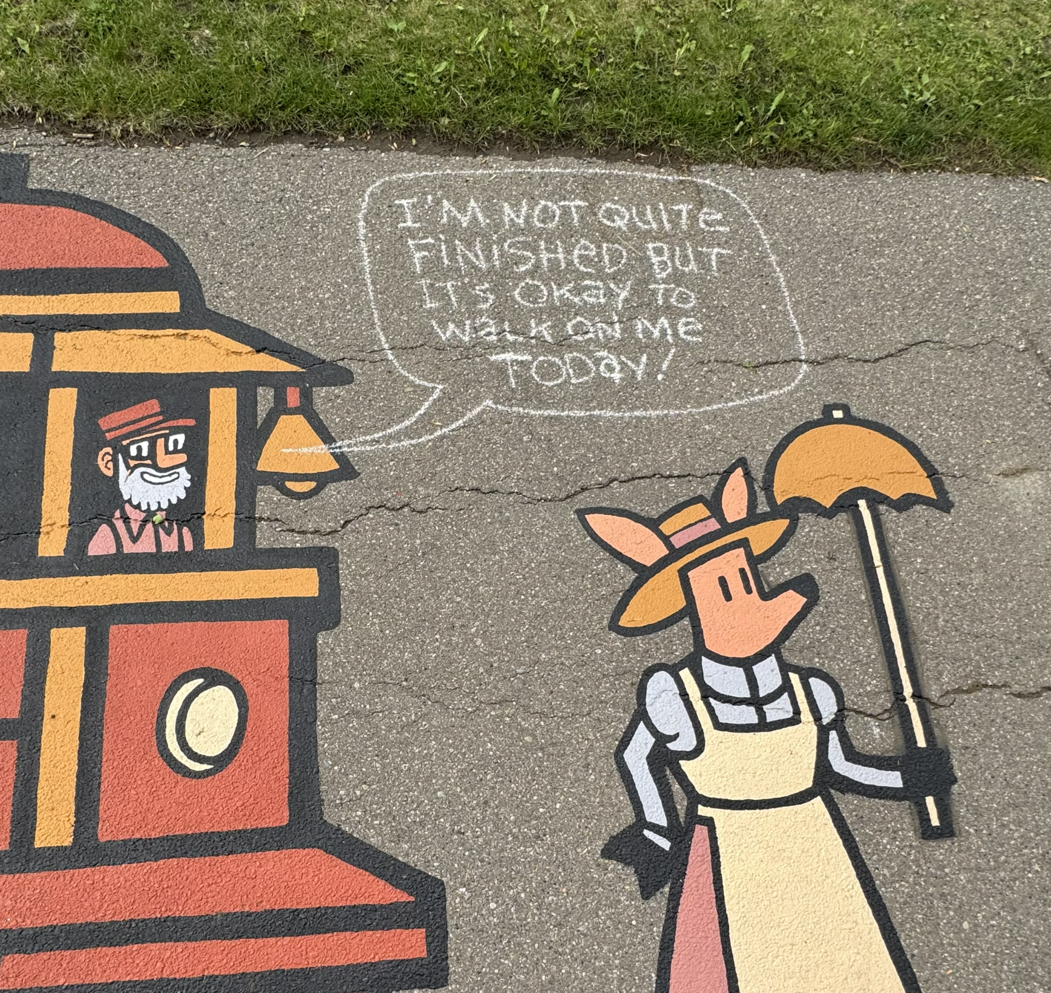 Aspalt painting on sidewalk showing the Lethbridge trolley and a deer in old-timey women's clothing with parasol. 